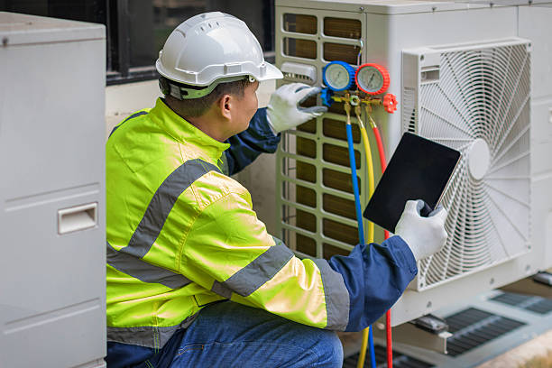 Professional Air Duct Cleaning technician working in Sun Valley, ID
